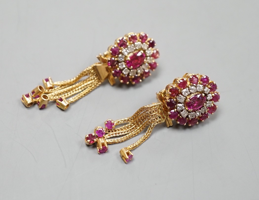 A pair of Middle Eastern yellow metal, ruby and diamond set oval cluster earrings, with detachable tassel drops, overall length 41mm, gross weight 15.5 grams.